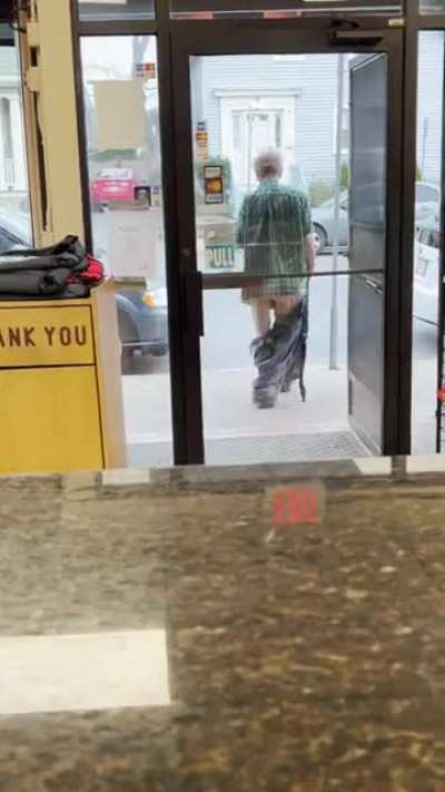 Old man drops trou in a restaurant NSFW