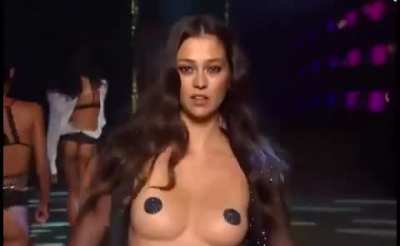 Topless on runway
