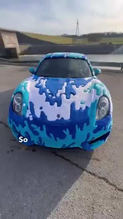 Porsche covered in rugs