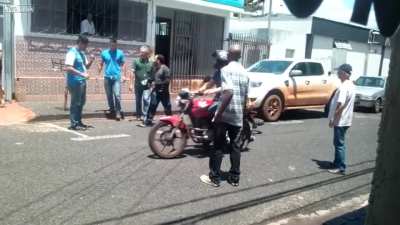 don't mess with a short guy on a motorcycle with a hammer in his hands