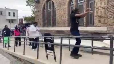 Dancing in the voting line to pass the time.