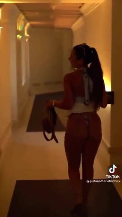 Flash ass in hotel hallway