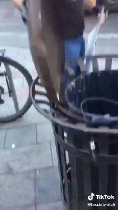 Proud Boy attempts to destroy Pride Sign