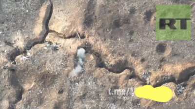 A Russian soldier kills an Ukrainian soldier in a trench at an extremely close range