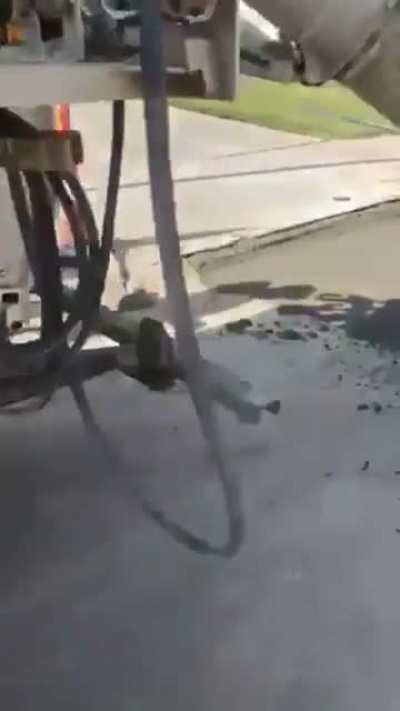 Old man freaks out over a truck parked outside his house, hits concrete company truck with a hammer then falls into wet concrete