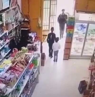 Israeli soldiers assault a Palestinian child in Hebron