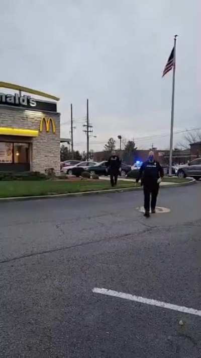 Man livestreaming arrest is slugged by cop with &lsquo;solid left hook&rsquo; and booked for menacing and for resisting arrest