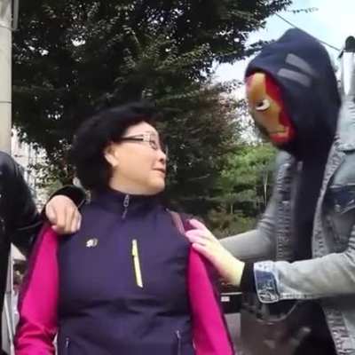 Asian people scared by iron man