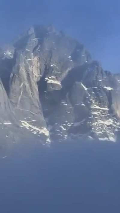 A mountain peak framed by the clouds