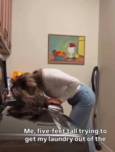 Milf goes headfirst in washer