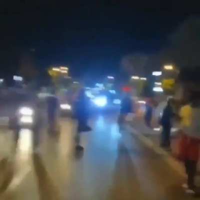 Dude protesting with a chainsaw