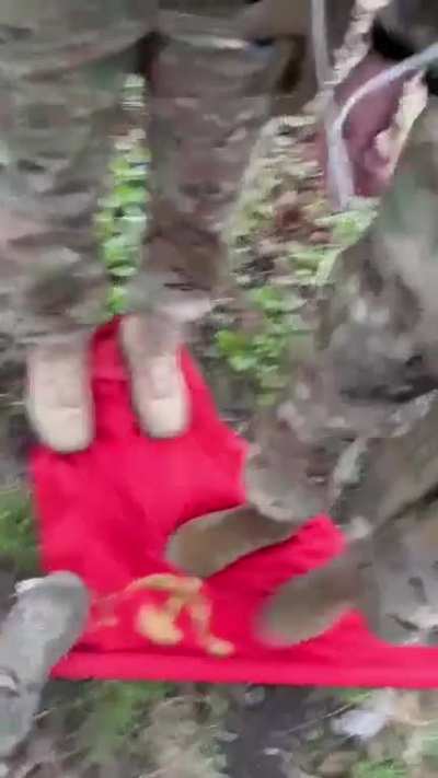 Soldiers from muslim "Adam Group" show the proper way to use flag under which their Tatar or Chechen ancestors were genocided in 1944