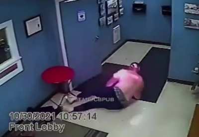 Tazeing a man covered in rubbing alcohol.