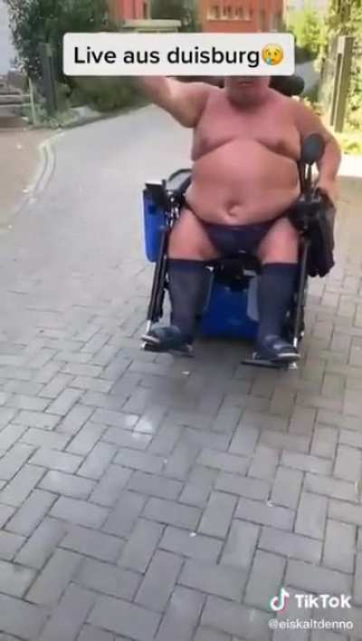 German gentlemen on a scoots is very upset with kids skateboarding near his home!!