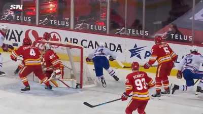 Nick Suzuki and Corey Perry each miss their hit and collide with each other