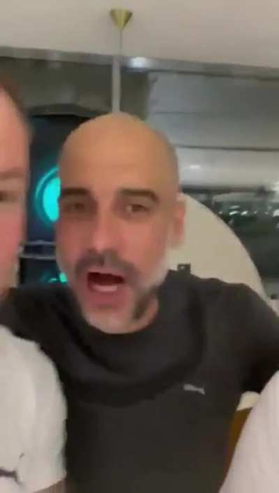 Pep smoking a cigar and singing Noel Gallagher at PL Celebrations.