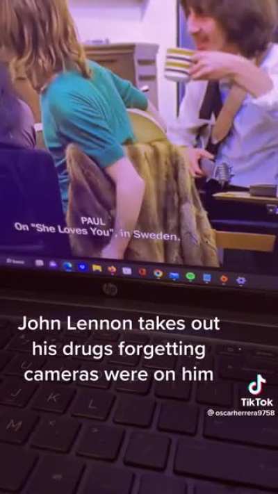 John Lennon takes out drugs &amp;amp; remembers they&rsquo;re being filmed.