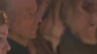 Jar Jar Binks Smiling at Qui-Gon Jinn's Funeral. That is All.