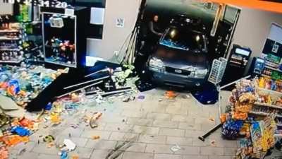 SUV intentionally runs people over inside a gas station