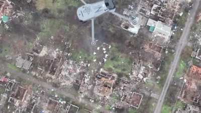 A Ukrainian drone knocking down a Russian drone coordinating artillery in the Donetsk oblast