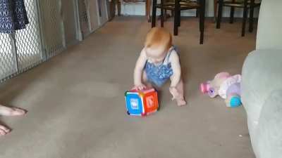 My niece getting way too excited about her music-cube-toy-thing