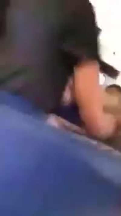 Girl literally stomps out other girl in schoolbus