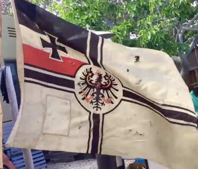 She may be patched and tattered, but after a century and a half she’s still here! My first version imperial German naval flag, with the old eagle.