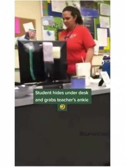 Teacher gets the grabby hand