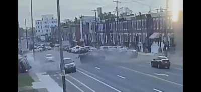 A van slams into another car and crashes into a fence, killing the 2 occupants inside the van