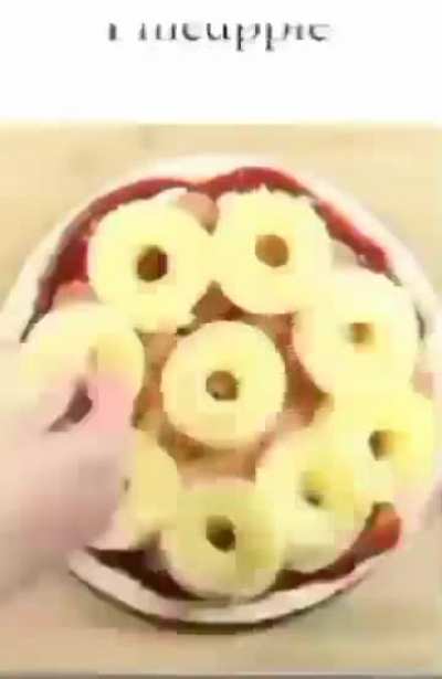 Pineapple pizza is not a crime, but i think whoever made this pizza Exaggerated