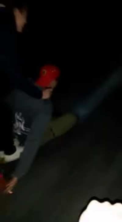 Seconds before tragedy. (Drunk me filming my also drunk friends who are driving on a motor board)