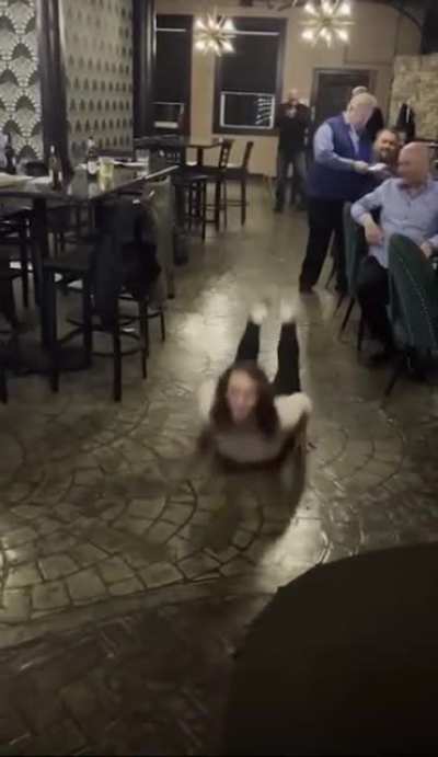 Lady does the worm and accidentally kicks her boss&rsquo;s prized jewels