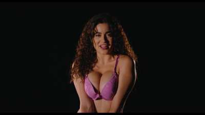 Paulina Gaitán in a bra showing her cleavage