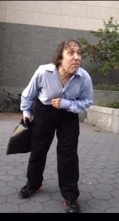 Grumpy old man harasses trumpet player