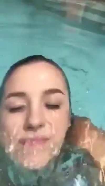 Squeezing her soft tits