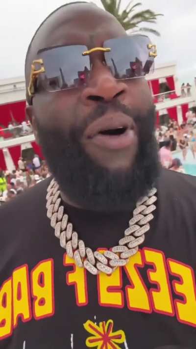 Rick Ross listening to "Not Like Us" at a Vegas pool party