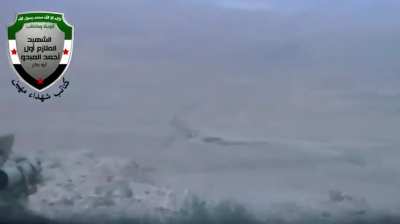 Maheen Martyrs Brigade 9M113 Konkurs team hits an SAA tank manning a checkpoint near Tank Depot 559 - E. Qalamoun - 2014