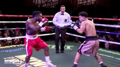 Rolando 'Rolly' Romero KO's Dieumerci 'Elephant' Nzau.
