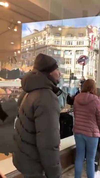 Man shouts at priest to "shut up bruv"