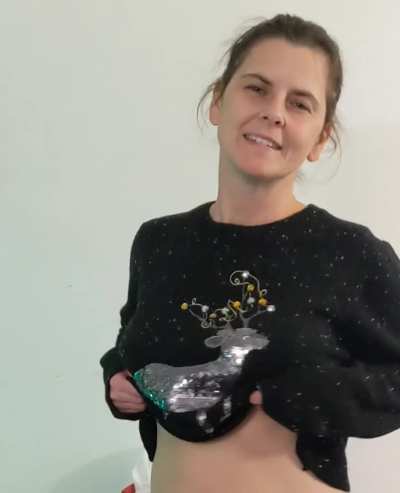 Average mom showing her Christmas sweater puppies [drop]