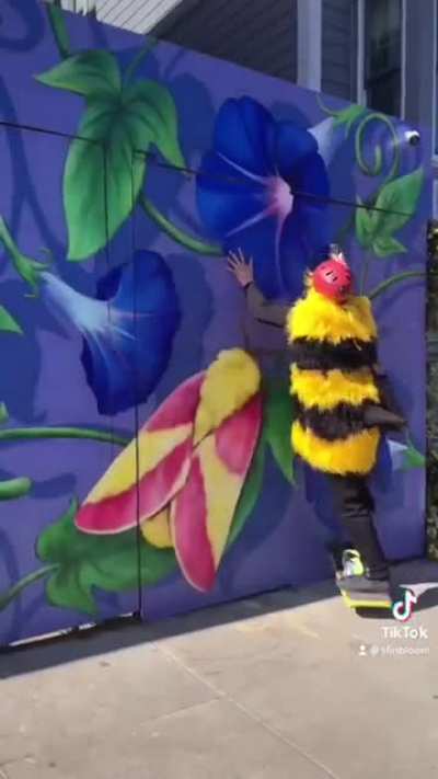 Bee spreading flowers