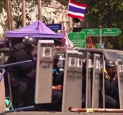 Thai Rioter Throws Hand Grenade At Police - Thailand Riot