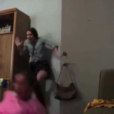 Twerking upside down on door