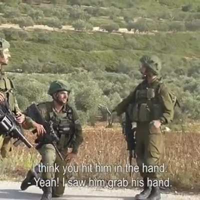 Israeli settler shoots Palestinian man and celebrates this isn&rsquo;t full clip but later on they zoom in on him and they throw tear gas (full video will be posted in comments)