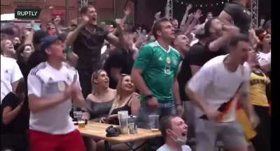 German fans celebrating M&uuml;ller's miss