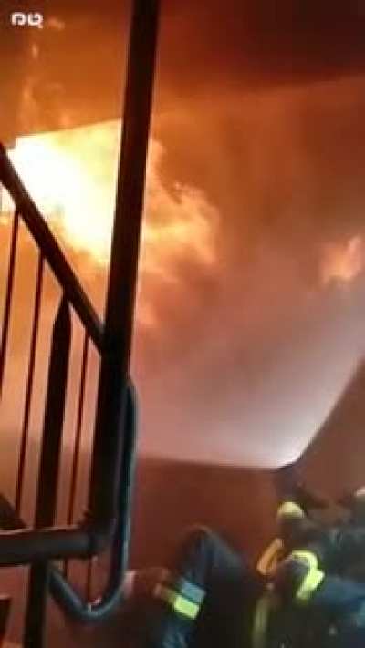 Two firefighters vs fire