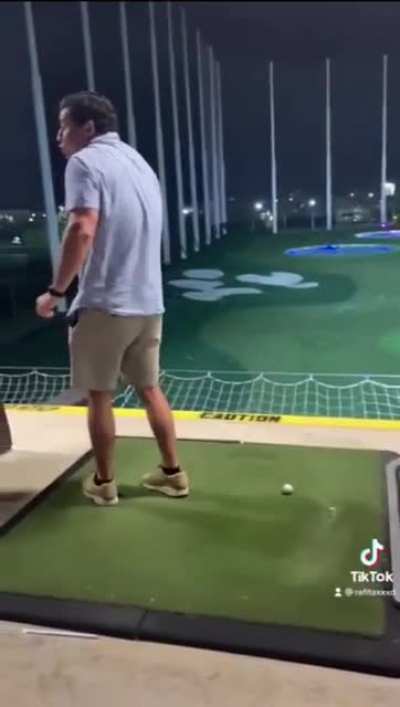 A friend failing at a Golfing Range