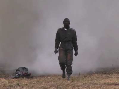 Russian combat suit tested. Walking through explosions.