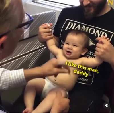 A clever doctor vaccinates a baby
