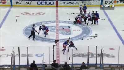 Hockey game begins with a 5 on 5 line brawl